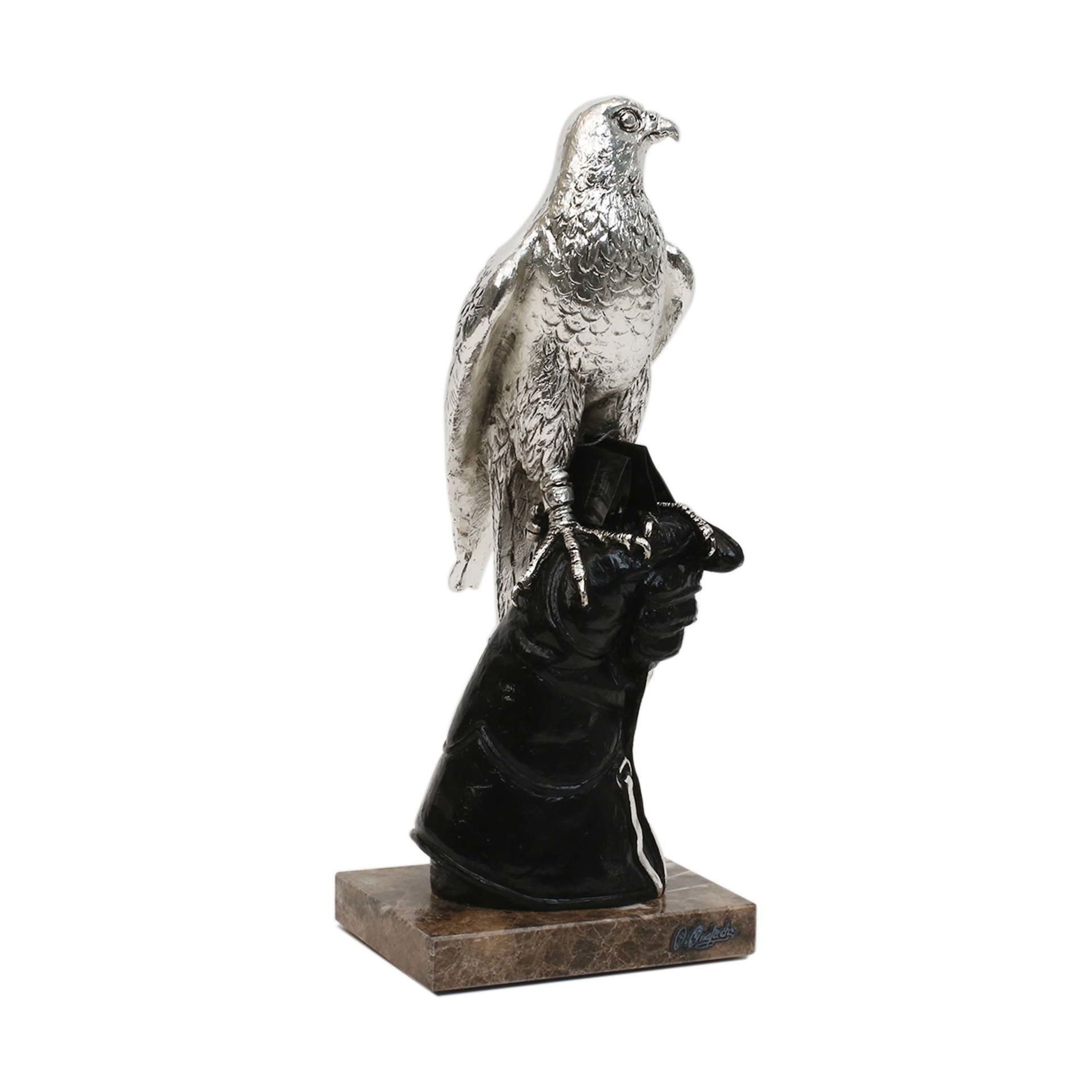 Picture of Falcon on Hand Sculpture Silver